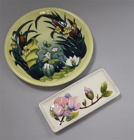 A Moorcroft Lamia pattern circular plate, boxed and a small rectangular Magnolia pattern dish